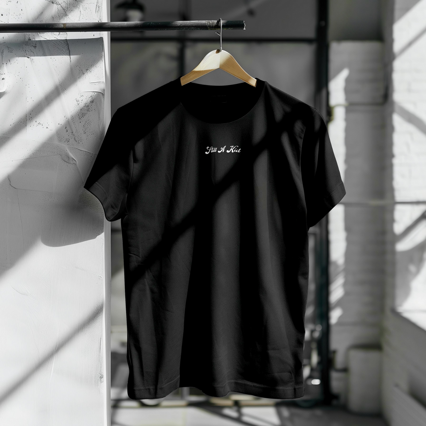 "STILL A KID" SCRIPT T-SHIRT - BLACK