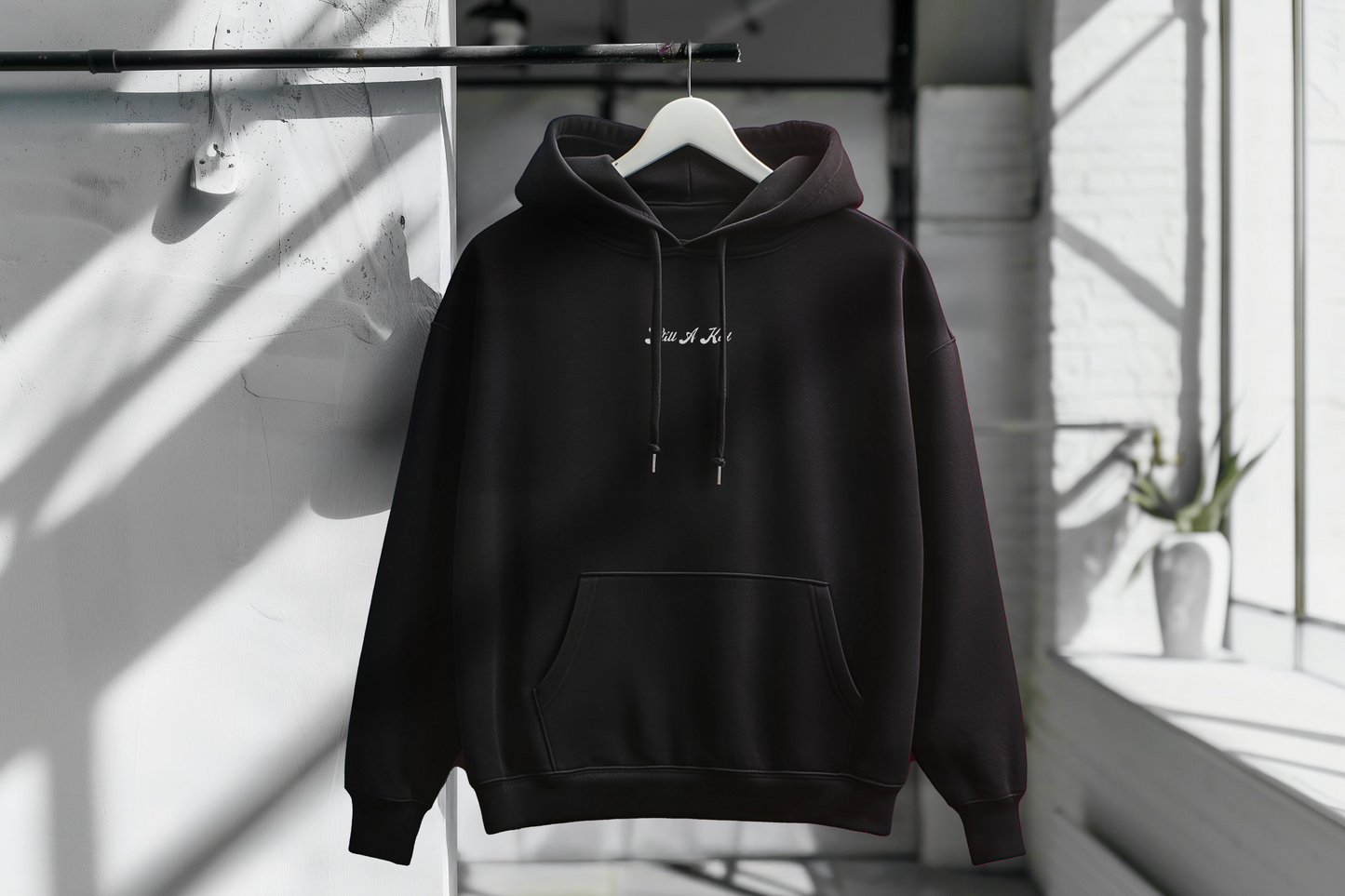 "STILL A KID" SCRIPT HOODIE